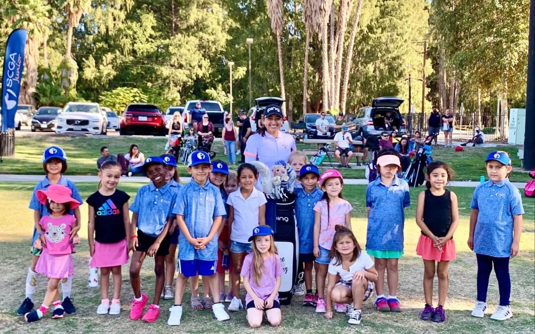 LPGA veteran Lee Lopez gives tips (and signs pumpkins!) at Riverside Girls Golf